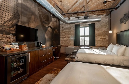 Fifth Ward Hotel | 4 Custom Deluxe 2 Queen Beds at The Iron Horse Hotel, Bring Along Your Pets!