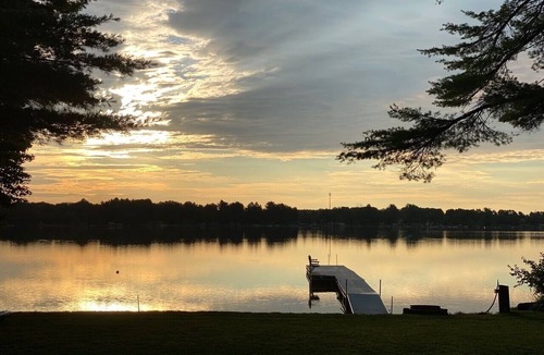 Gaylord House | Beautiful lakeside home with private beach, access to golf, skiing, shopping.