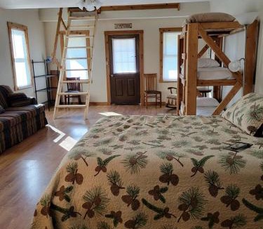 Moscow House | Comfortable Camping Cabins with View of the Cedar River for a Family Weekend Getaway