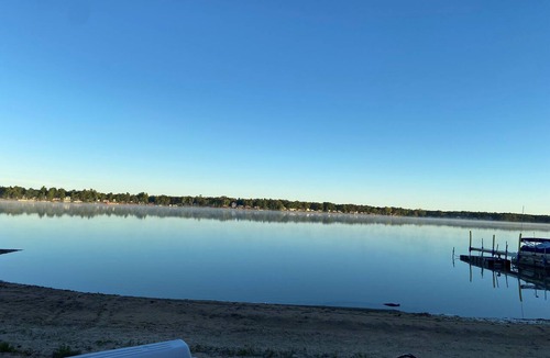 National City Cottage | Lake/beach front property with kayaks, pedal boat, & row boat, near Tawas Bay
