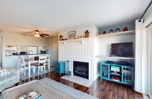 Maple City Condo | Riverview condo near the lake with beach access, fireplace, patio & cable