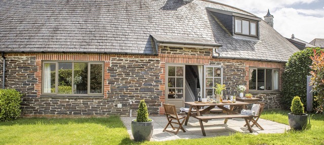 A stunning holiday home located in the Curved Stables at Roserrow. in Wadebridge