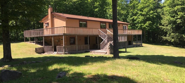 Atv-Snowmobile Trail, sits on the Laughing Whitefish River, sleeps 16 people. in Deerton