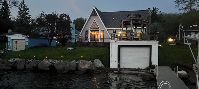 Beautiful lakefront home directly on Hubbard Lake, East Shore in Spruce