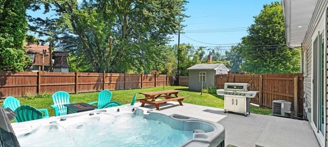 Cozy 3BR Getaway with Hot Tub, Firepit & BBQ in Clinton Township