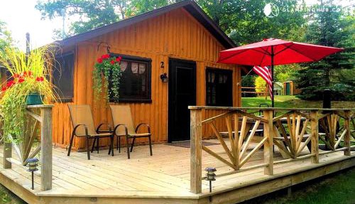 Cozy Cabin Rental with Stunning Lake Views in West Branch, Michigan in West Branch