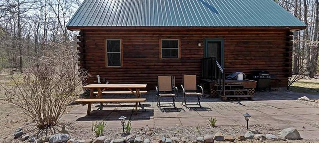 Cozy Forest Cabin with Fireplace Near Lake Michigan Beaches in Manistee, Michigan in Manistee