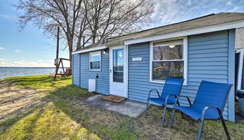 Cozy Lakeside Cabin with Dock & Fire Pit Access in Houghton Lake, Michigan in Houghton Lake