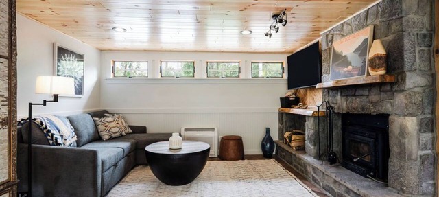 Cozy River Cabin | Private Deck & Shared Riverside in East Jordan