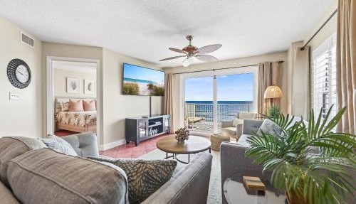 Direct oceanfront corner 2/2 with stunning views, huge balcony, heated pool, and garage parking in Ormond Beach