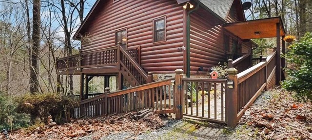 Discover tranquility at Hidden Oasis, a charming home nestled in serene Cherry Log Mountain in Cherry Log