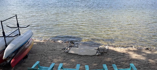 Enjoy 200 Feet of Private Frontage on Spider Lake in Traverse City