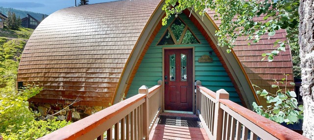 Iconic creekside mountain home with hot tub, fireplaces, balcony & amazing views in Alta