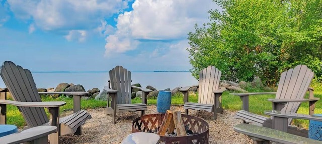 Lakefront Fire Pit + Deck View Private Balcony in Fort Atkinson