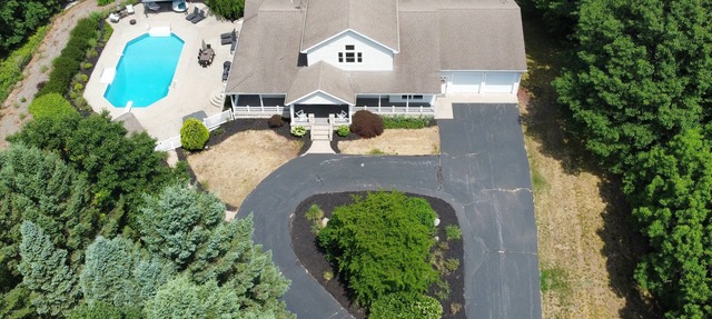 Private heated pool, ATV trails and shooting range on 20 acres in Mears