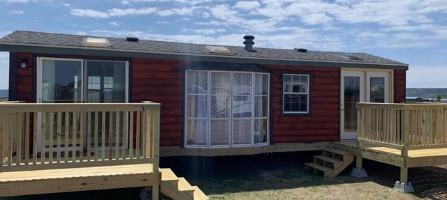 Private Tiny Home with deck, fire pit & patio near Platte Creek Recreation area in Platte