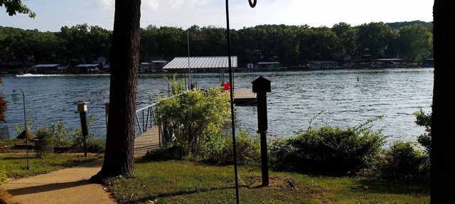 Quiet location, beautiful lakefront home in a cove. Private covered boat dock! in Graovis Mills