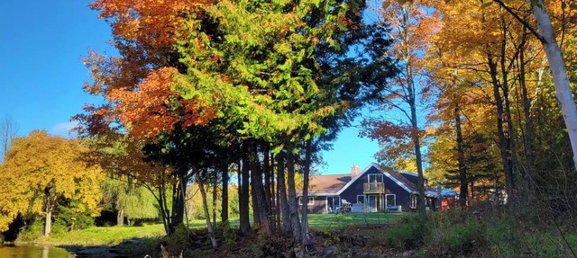 Remodeled lodge on 73 acres with 1/2 mile riverfront in Michigan's UP wilderness in Trenary