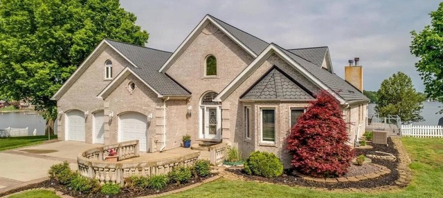 RESORT LIVING 30 MINUTES FROM THE ARCH! GORGEOUS WATERFRONT HOME AWAITS! in Edwardsville
