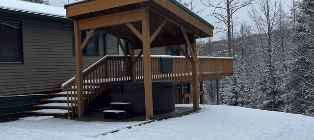 Ski getaway with Hill view and Hottub! in Iron River