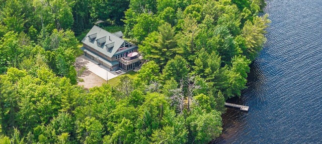 Spacious Lakefront Retreat with Dock & Canoes in Tomahawk