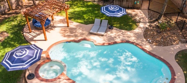 Spring 5BR Sleeps 16 | Heated Pool, Hot Tub, EV Charger, Train Theme in Spring