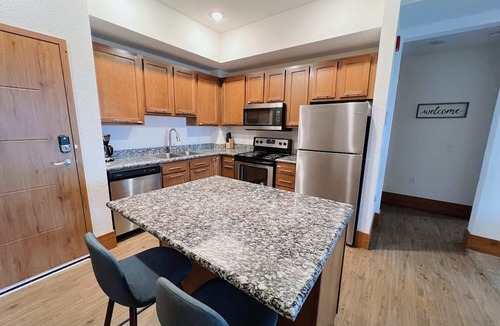 Grandville Apartment | 2BR Suite at The Grand Castle Pool, Gym & Parking
