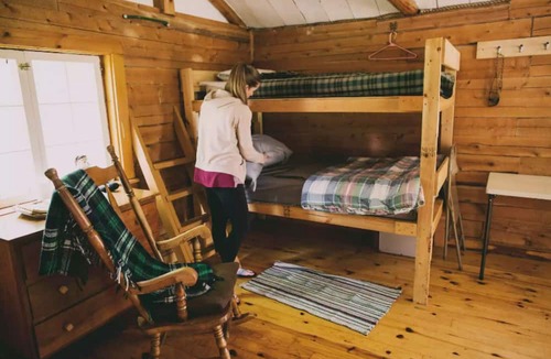 Rapid River Cabin | Cabin on lake with sauna - pets ok. Kayaks and boat provided.