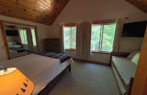 Hillman Ski Chalet | Chalet at Thunder Bay Hot tub Pontoon Boat Pet friendly