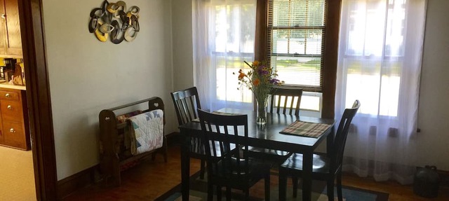 Cozy home with large porch near downtown riverfront, dining and entertainment in Wisconsin Rapids